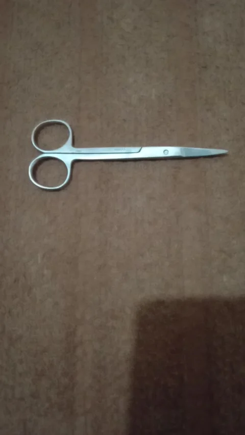 Steel Scissor on table Stock Footage 321926543