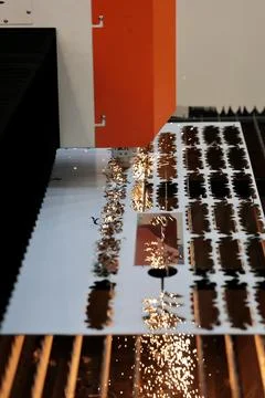Steel sheet process with CNC laser cutting machine Stock Photos
