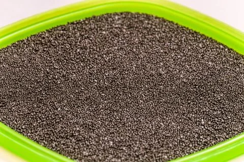 Steel shot for blasting machine in container. Limited depth of field. Stock Photos