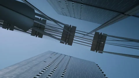Steel structure between two sky scrapers on a sunny day low angle Stock Footage 130294008