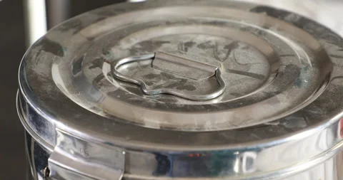 Steel tin on table Stock Footage 281541738