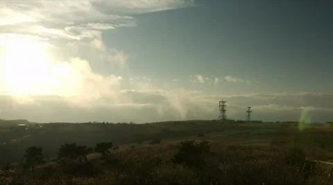 Steel tower and cloud stream wide angle at Takabocchikogen, no grade Stock Footage 68445321