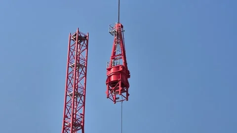 Steel Tower Section Reaching Top of Tower Crane Mast Stock Footage 334598209