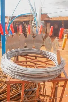 Steel wire and tools common in african on display at a local hardware shop .. Stock Photos
