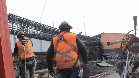 Steel workers on beams Stock Footage 77100772