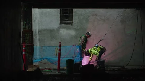 Steel workers welding structure Stock Footage 136807950