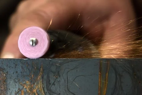 Steels grinding using abrasive tool Stock Photos