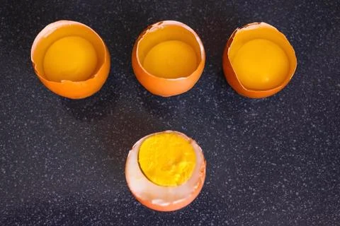 Steep and raw eggs. Stock Photos