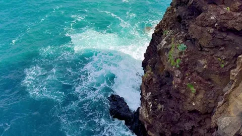 A steep cliff hanging over the ocean. Madeira. Portugal. Stock Footage 304281126