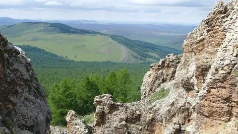 Steep cliffs against the background of a  scenic  landscape. Stock Footage 82220498