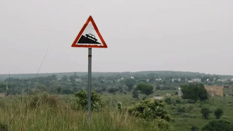 Steep Descent Grade Ahead Or Driving Down A Sloped Surface Sign On Road Stock Footage 343239485
