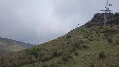 Steep Grass Slope to Summit with Cable Car Pylon, Cruz Loma, Quito, Ecuador 8K Stock Footage 331494478