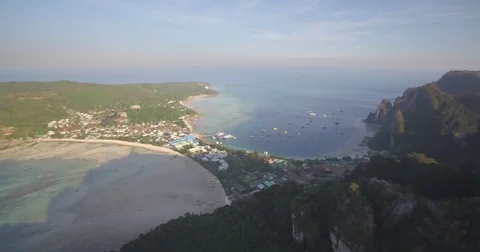 Steep Limestone Cliffs Overlooking Sandy Isthmus, Phi Phi Islands, Thailand, Stock Footage 79246783