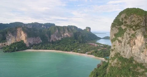 Steep Limestone Cliffs at Railay Peninsular, Krabi, Thailand, Ascending Drone 스톡 동영상 78992564