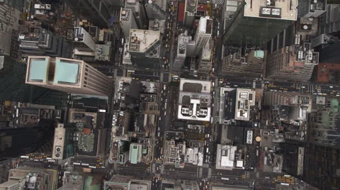 Steep look down onto buildings and streets of Midtown Manhattan. Shot in 2011. Stock Footage