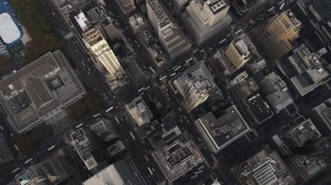 Steep look down into New York's urban canyons near Rockefeller Center and Times Stock Footage 59526920
