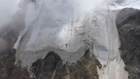 A steep mountain pass with glacier Stock Footage 169745943