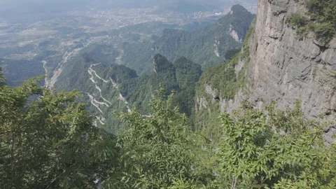 Steep Mountain Slope With Winding Road Panoramic 스톡 동영상 331099448