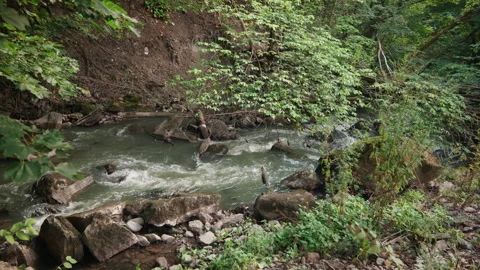 Steep Norway Gully with Fast Stream and Concrete Debris Video stock 345767348