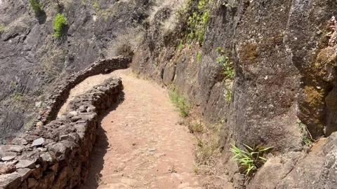 Steep path from Cova crater vulcano to Paul valley Cape Verde Stock Footage 320471515