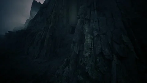 Steep precipice overlooking restless waters and scattered rocks scene Stock Footage 339802648