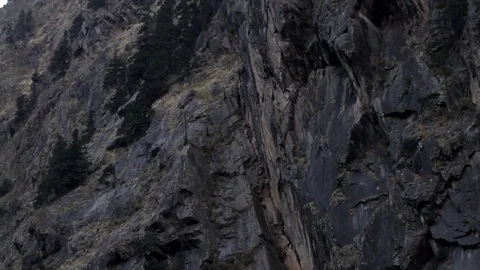 Steep rock face and river Ganges in the himalayas 스톡 동영상 102518975