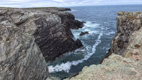Steep rocky Welsh coast looking across the Irish seascape Видео 337924275