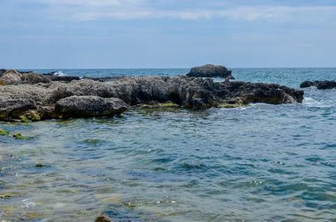 Steep, sharp, stone beaches on the Black Sea coast, in the vicinity of the city Stock Photos