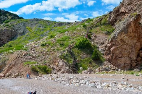 Steep, sharp, stone beaches on the Black Sea coast, in the vicinity of the city Stock Photos