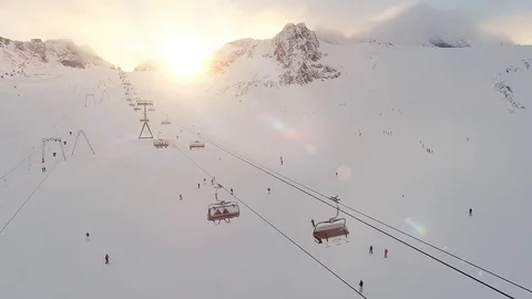 Steep slopes of Alpine ski resort. High altitude in snowy mountains. Stock Footage 117735780