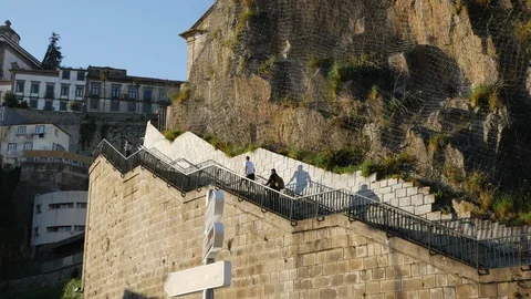Steep steps up cliff face in Porto city, on banks of Douro river, Portugal Stock Footage 105011515