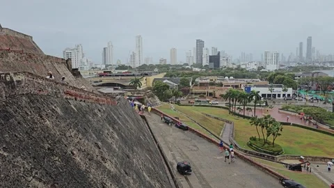 Steep Stone Bastion Wall Over Lawns and Skyline, Colombia 8K Stock-Footage 331509426