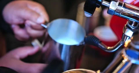 Steeping milk for latte coffee in a coffee machine Video stock 301748134