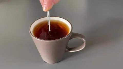 Steeping tea bag slowly Stock Footage 341983145