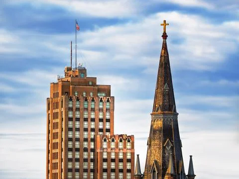 Steeple and skyscraper Stock Photos