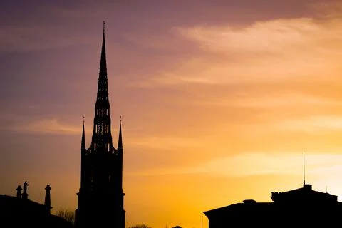 Steeple and sunset sky Stock Photos