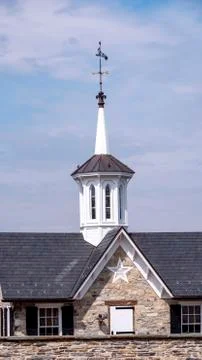 Steeple Cupolas with a Weather Vane Stock Photos