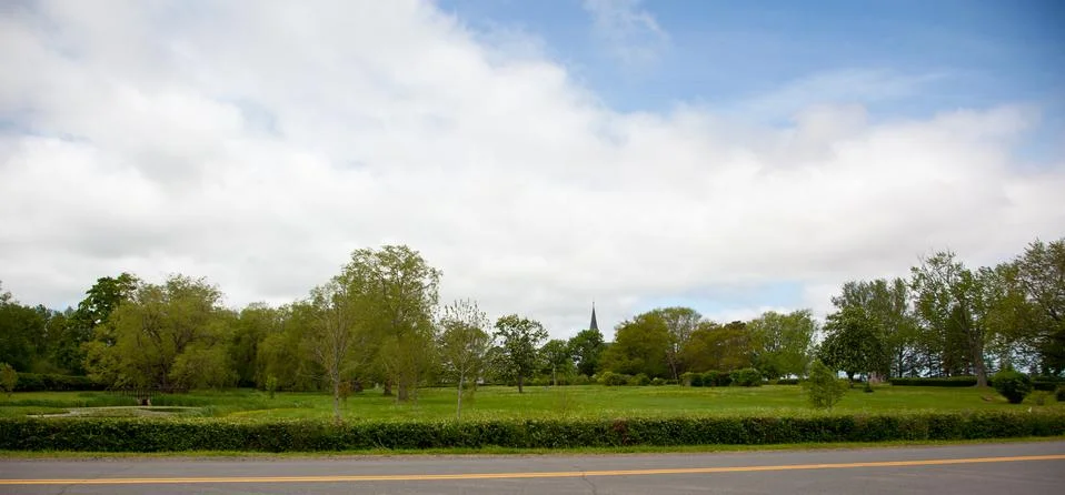 Steeple through the park Stock Photos