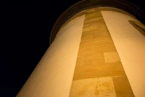 Steeple in yellow light Stock Photos
