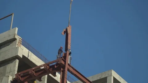 Steeplejack workers on construction activities Stock Footage 78232786