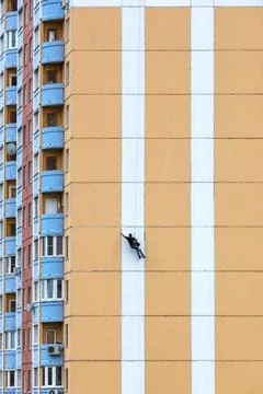 Steeplejacks on a concrete wall Stock Photos