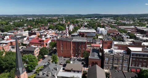 Steeples and Spires in an Old Historic Downtown Aerial View Frederick Maryland Video stock 335678444