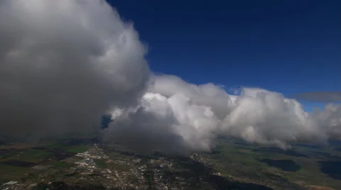Steeply tilting flight through cloud mass Stock Footage