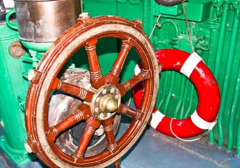 Steering the boat. Stock Photos