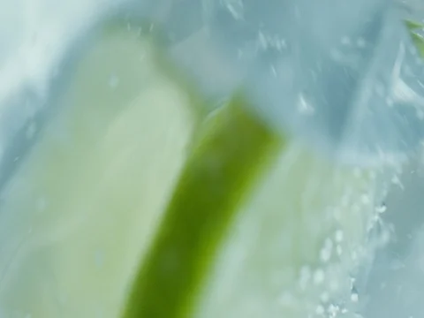 Steering the icy drink macro Stock-Footage 76675695