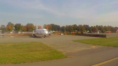 Steering passenger liner, ground inside pov city civil airport, click for HD Stock Footage 43965143