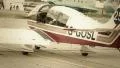 Steering war airplane with propeller on ground at airport HD Footage