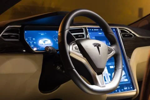 Steering wheel and dashboard of Tesla Model S Stock Photos