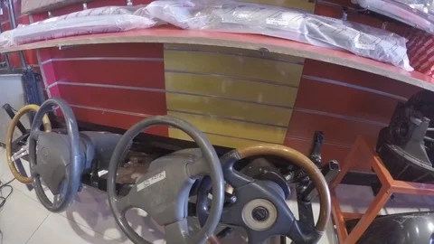 Steering wheel and terminators in a store Stock Footage 97242831