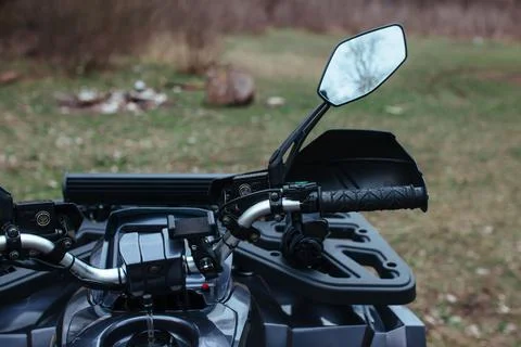 Steering wheel of an ATV. Stock Photos